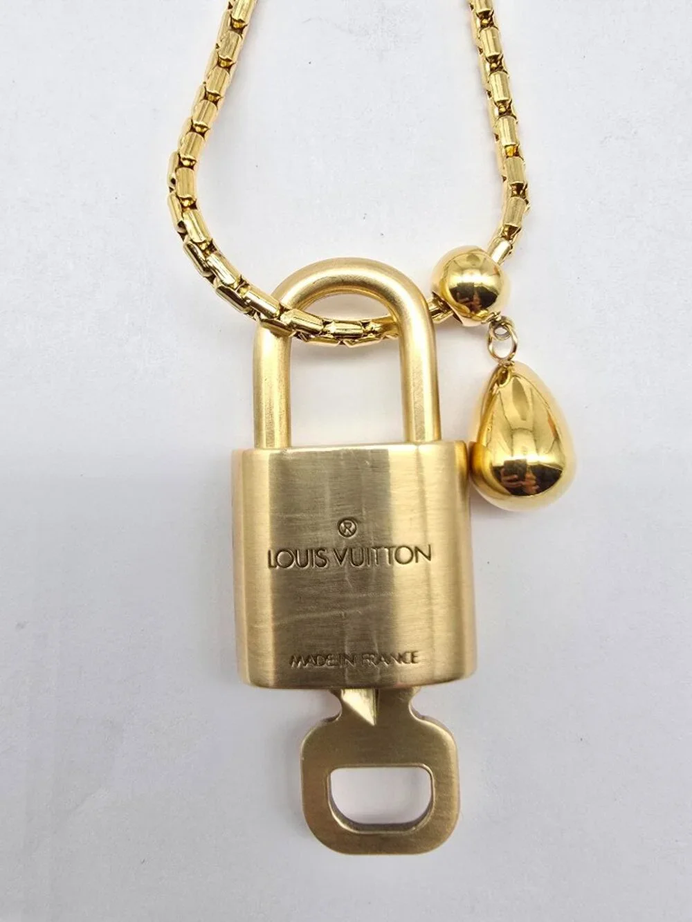 ✨ Stainless Steel Gold-Plated Necklace with Authentic Louis Vuitton Padlock ✨